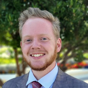 Headshot of Skill-Dev Software Developer, Adam Lore
